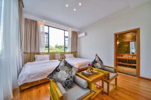 Postel nebo postele na pokoji v ubytování Yunshuo Dali Light luxury Guesthouse