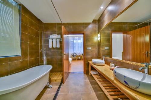 Koupelna v ubytování Yunshuo Dali Light luxury Guesthouse