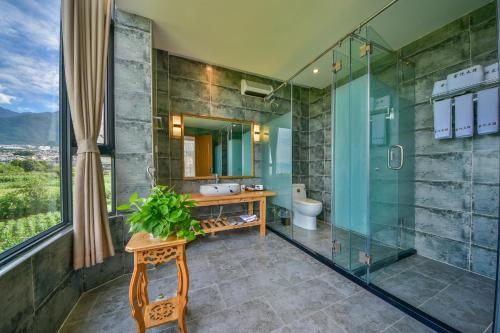 Ванна кімната в Yunshuo Dali Light luxury Guesthouse