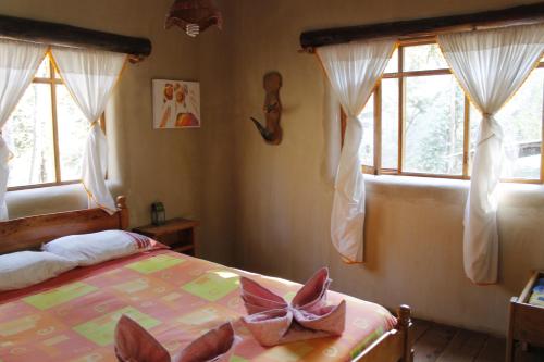 Llit o llits en una habitació de Altai Oasis Lodge