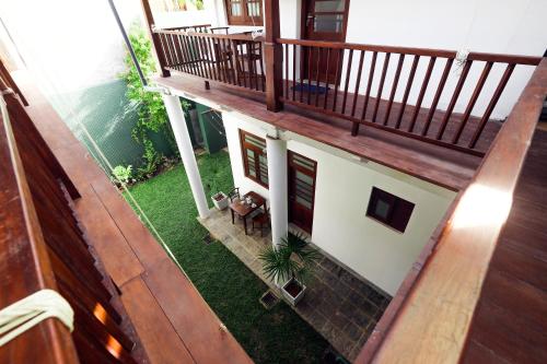 an overhead view of a house with a balcony at Knight Inn - Galle Fort in Galle