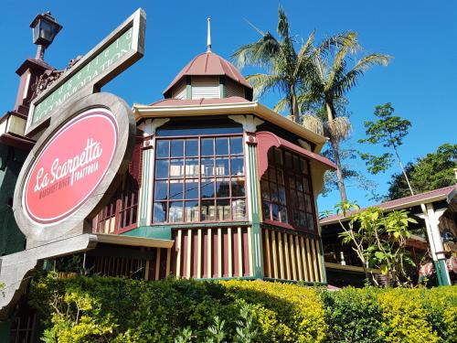 a building with a street sign in front of it at Bridgefield Guest House in Margaret River Town
