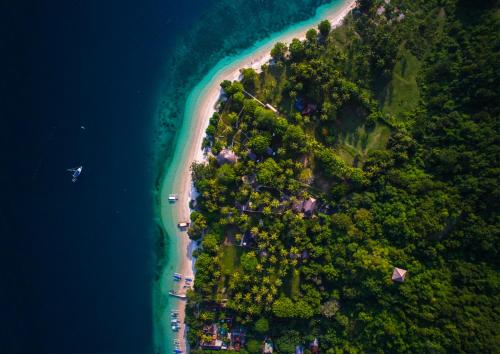 an aerial view of an island in the ocean at Gili Asahan Eco Lodge & Restaurant in Gili Asahan