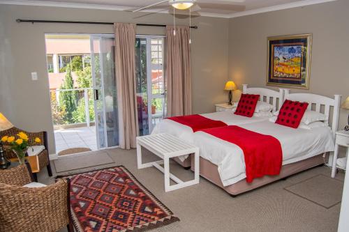 Lova arba lovos apgyvendinimo įstaigoje Diaz Beach Guest House