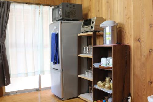Kuchyň nebo kuchyňský kout v ubytování Cottage Yakusugi House