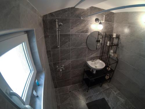 Koupelna v ubytování Graf Ignatiev - 3BR APART