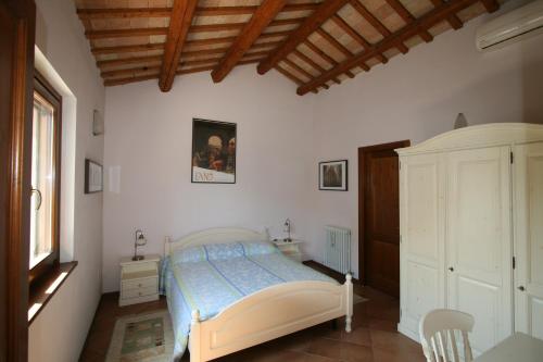 Katil atau katil-katil dalam bilik di Agriturismo Monte Giove-Villa Mariotti