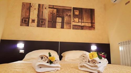 Katil atau katil-katil dalam bilik di B&B Portacastello