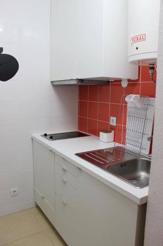 Dapur atau dapur kecil di Pedras Del Rei Studio