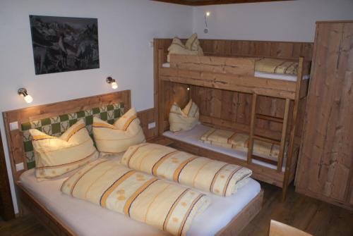 Postel nebo postele na pokoji v ubytování Pension Chalet Bergseegut