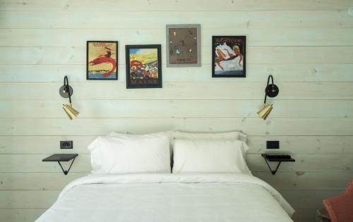 Ένα ή περισσότερα κρεβάτια σε δωμάτιο στο Higgins Beach Inn