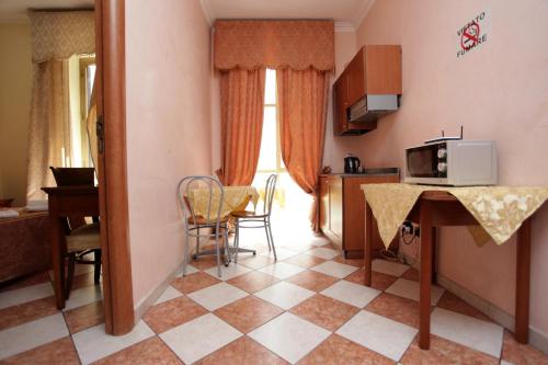 Kuchyň nebo kuchyňský kout v ubytování Elegance