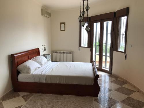 A bed or beds in a room at Casa Canela