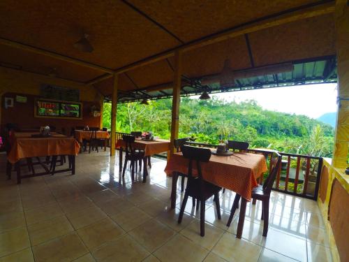 ห้องอาหารหรือที่รับประทานอาหารของ Pondok Batur Indah Homestay Karangasem