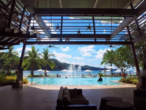 Bazén v ubytování Pico de Loro Lagoon View nebo v jeho okolí