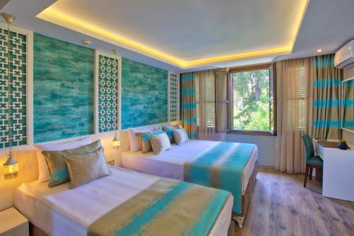 Katil atau katil-katil dalam bilik di Route Hotel Kaleici - Adult Only (12+)