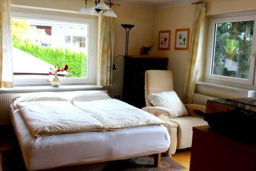 En eller flere senge i et værelse på Ferienwohnung Stuibenfall