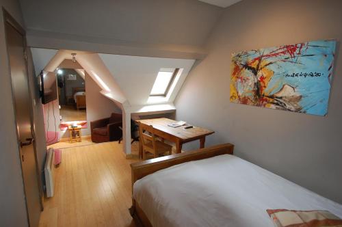 Postel nebo postele na pokoji v ubytování Hotel Piano 2 - Mont-St-Guibert - Louvain-la-Neuve