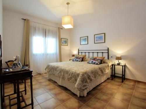 Postel nebo postele na pokoji v ubytování Nice Holiday home in Andalusia with pool