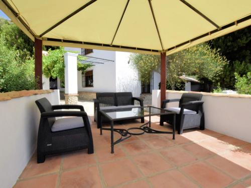 Posezení v ubytování Nice Holiday home in Andalusia with pool