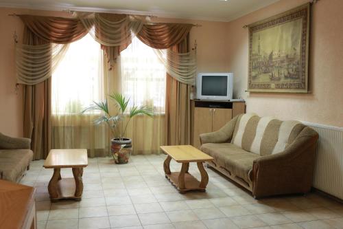 TV a/nebo společenská místnost v ubytování Hotel Smaragd