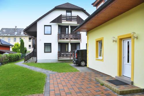 a van parked in front of a house at Pension v Jeseniku in Jeseník