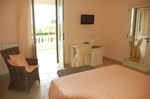 Postel nebo postele na pokoji v ubytování B&B Villa Vittoria