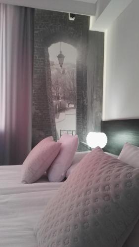 Postel nebo postele na pokoji v ubytování Willa Sandomierska
