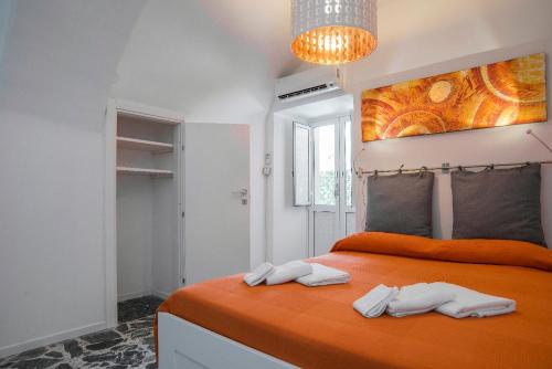Postel nebo postele na pokoji v ubytování Fèdeli House City