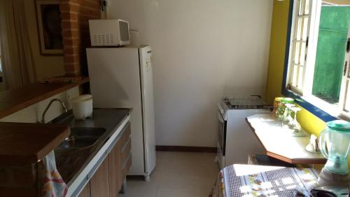 Dapur atau dapur kecil di Hotel Vivenda Penedo