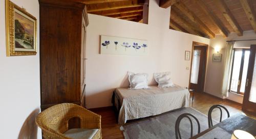 En eller flere senge i et værelse på I Tigli di Altavilla