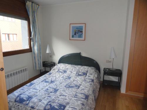Una cama o camas en una habitación de Sol Tarter