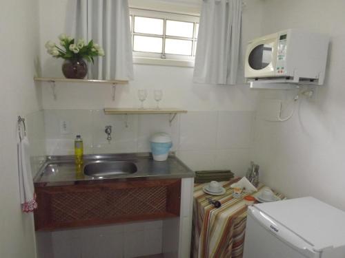 Dapur atau dapur kecil di Hotel Vivenda Penedo