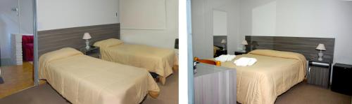 Łóżko lub łóżka w pokoju w obiekcie Rioma Hotel
