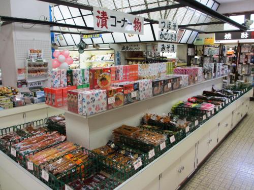 a store aisle with a lot of food on display at Shibushiwan Daikoku Resort Hotel in Shibushi