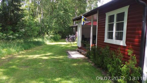 a group of people riding bikes in the doorway of a house at Ystad Holiday Houses in Ystad