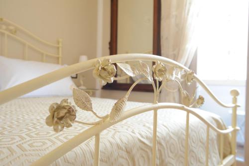 Ένα ή περισσότερα κρεβάτια σε δωμάτιο στο Residenza Borbonica
