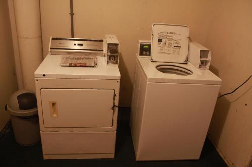 two machines sitting next to each other in a room at Royal Inn in Mount Vernon