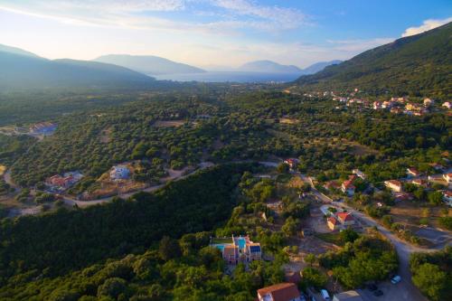 an aerial view of a small town in the mountains at stunning tranquil villa with private pool in Sami