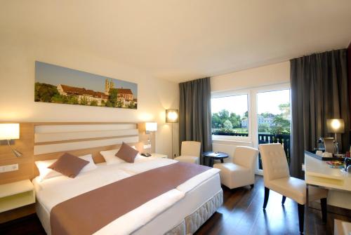Cama o camas de una habitación en Hotel Goldener Knopf