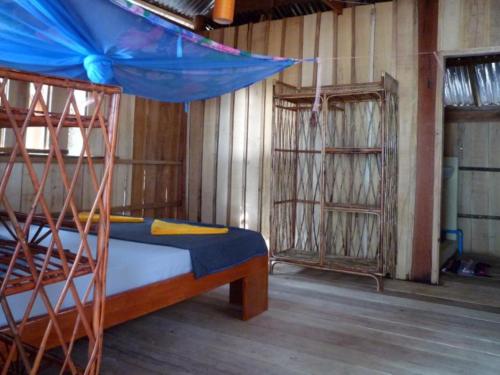 Postel nebo postele na pokoji v ubytování Koh Thmei Resort