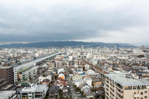 an aerial view of a city with buildings at Hotel Hewitt Koshien in Nishinomiya