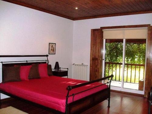 Cama o camas de una habitación en Quinta do Jaco