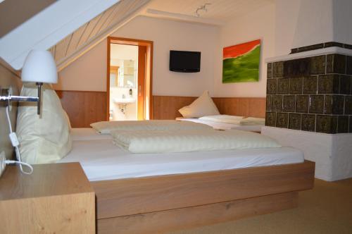 Posteľ alebo postele v izbe v ubytovaní Hotel Daimerwirt