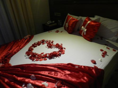 Paradise Inn Hotelにあるベッド