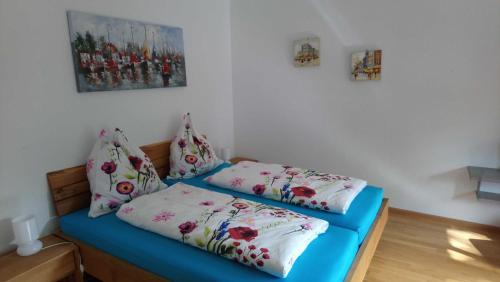 a room with a bed with two pillows on it at Evelyn Klaeger in Freiburg im Breisgau