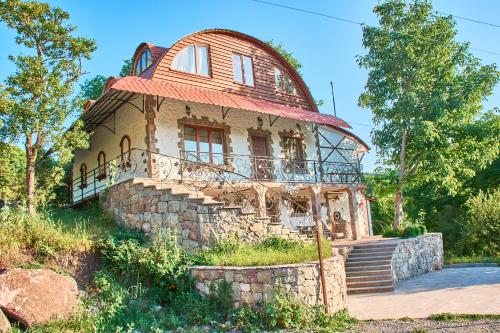 an old building with a dome on top of it at ART Chalet in Akhaltsikhe
