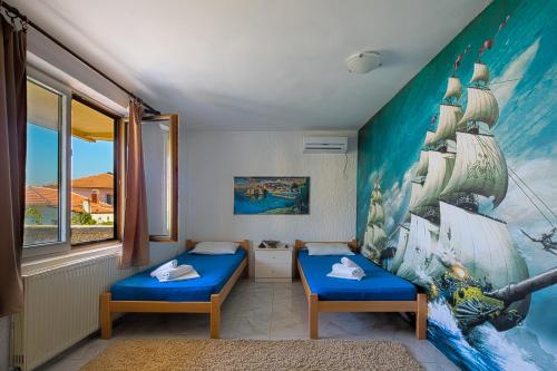 Voodi või voodid majutusasutuse Pirate Backpackers toas