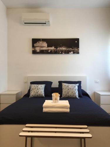 A bed or beds in a room at Aquarius Rome