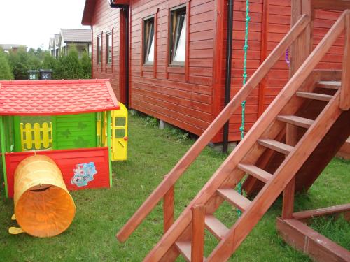 Children's play area at Ośrodek Wypoczynkowy "Słoneczko"